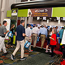 Attendees enter the exhibit hall at 2019 National